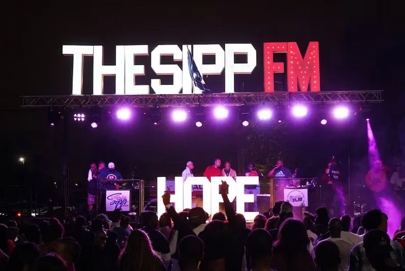 Corporate event stage with marquee letters