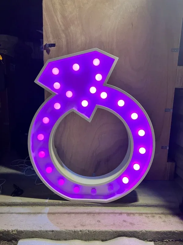 Corporate event stage with marquee letters